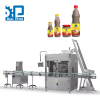Máy chiết xoắn nắp chai mắm tôm