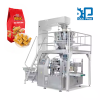 Máy đóng gói kẹo lạc túi có sẵn cân định lượng rotary cấp liệu tự động